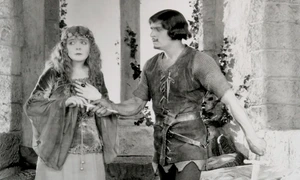 Douglas Fairbanks (Robin Hood) și Enid Bennett (Lady Marian). Scenă din filmul american „Robin Hood”, din 1922 (© United Artists / Wikimedia Commons)