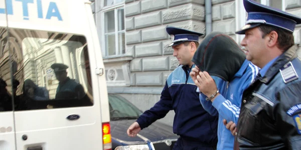 Poliţistul Ciprian Mureşan a primit mandat de arestare pentru 29 de zile