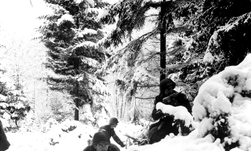 American 290th Infantry Regiment infantrymen fighting in snow during the Battle of the Bulge jpg