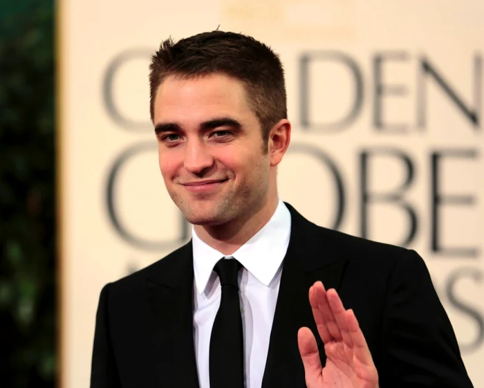 Robert Pattinson a trecut repede peste despărţirea de Kristen Stewart FOTO Reuters