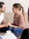 happy smiling young couple holding hands consulting psychologist planning wedding jpg