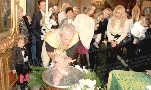 Dan Petrescu şi soţia lui,  Adriana, sunt părinţii  spirituali ai micuţilor Maria şi Cristian jpeg