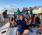 Eugen Degeratu - românul stabilit în Cancun - Mexic manager într-un hotel de cinci diamante în imagine împreună cu clienţii Foto Adevărul - credit Eugen Degeratu