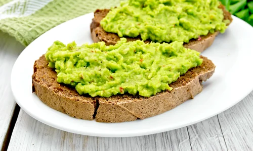 35973827   sandwich with guacamole on light board jpeg