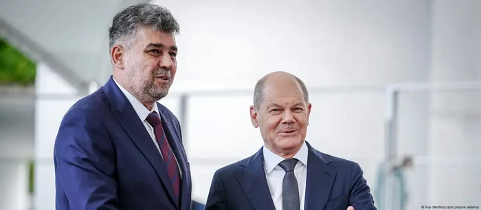 Marcel Ciolacu alături de cancelarul federal Olaf Scholz (imagine din 2023)