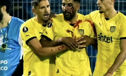 Maxi Oliveira (centru), captura Youtube jpg