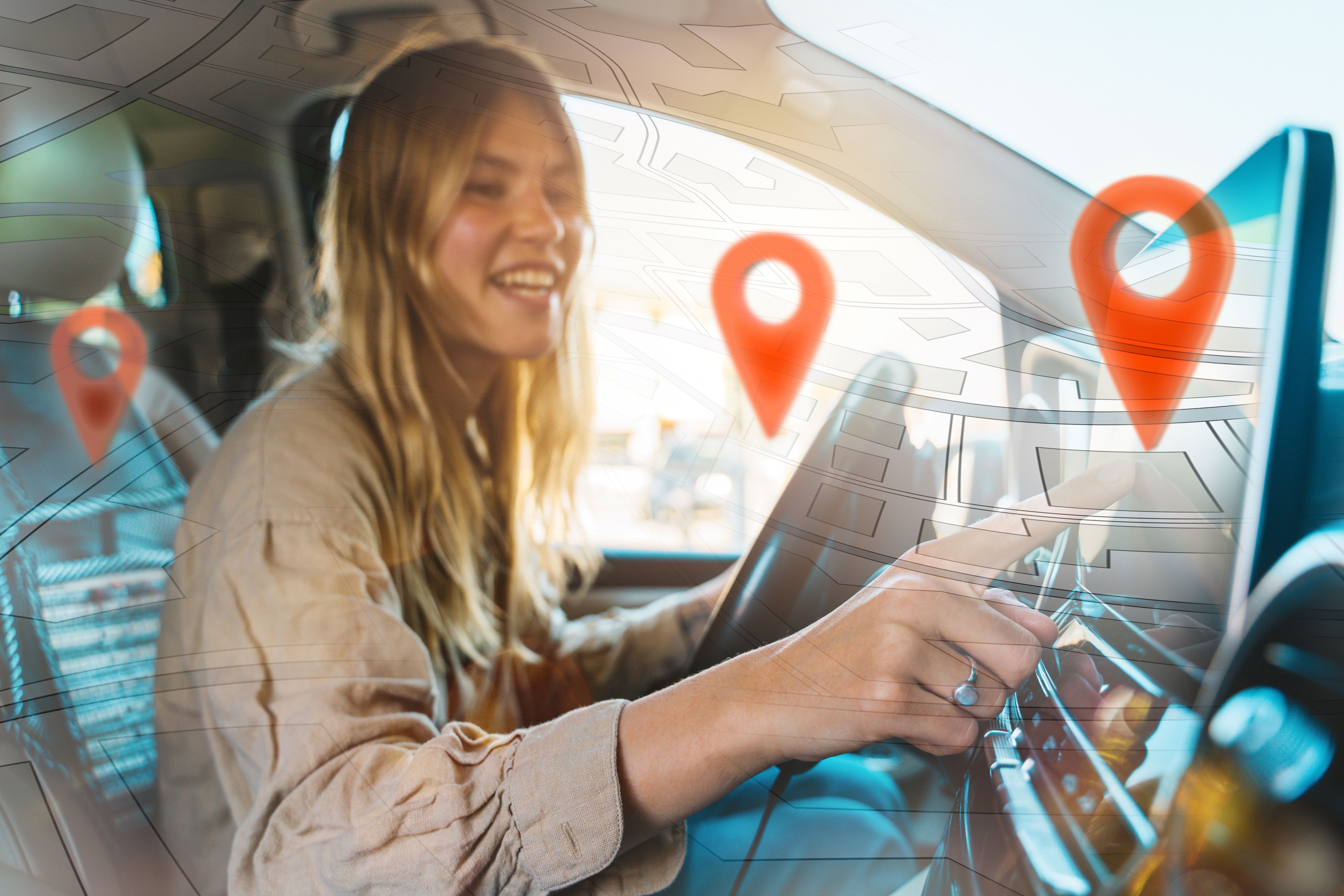 woman selects destination with car gps navigator jpg