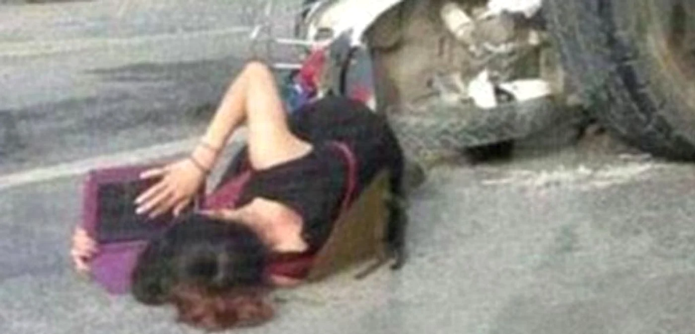 Wang Dafan, în mijlocul drumului, aşteptând ambulanţa şi învăţând limba engleză