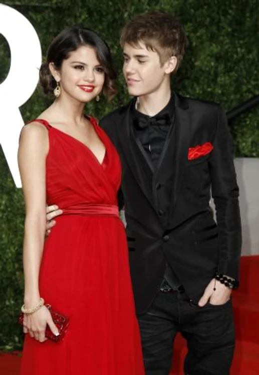 Singer Justin Bieber and singer Selena Gomez arrive at the 2011 Vanity Fair Oscar party in West Hollywood jpeg