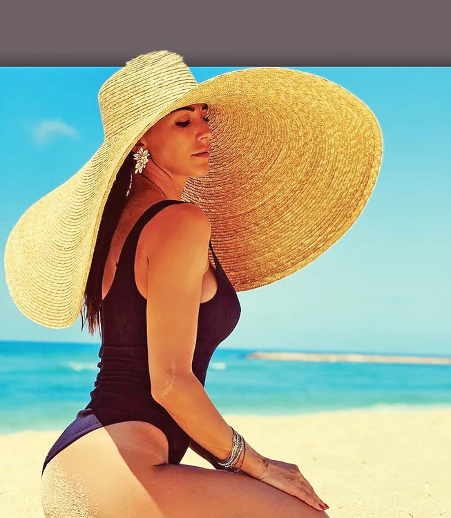 A avut o  pălărie cât  toate zilele,  ca să o  protejeze  de soare