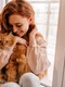 relaxed smiling girl playing with her fluffy cat indoor shot amazing lady holding pet jpg