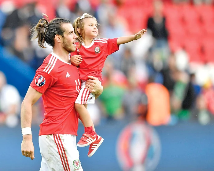 Imediat după joc, Bale şi-a luat fetiţa în braţe