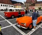 Automobile clasice expuse în Piața Sfatului din Brașov.