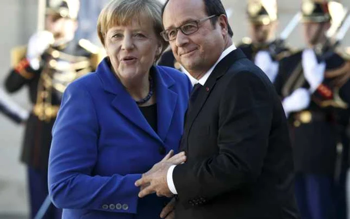 Angela Merkel, întâmpinată de Francois Hollande la Paris FOTO AFP