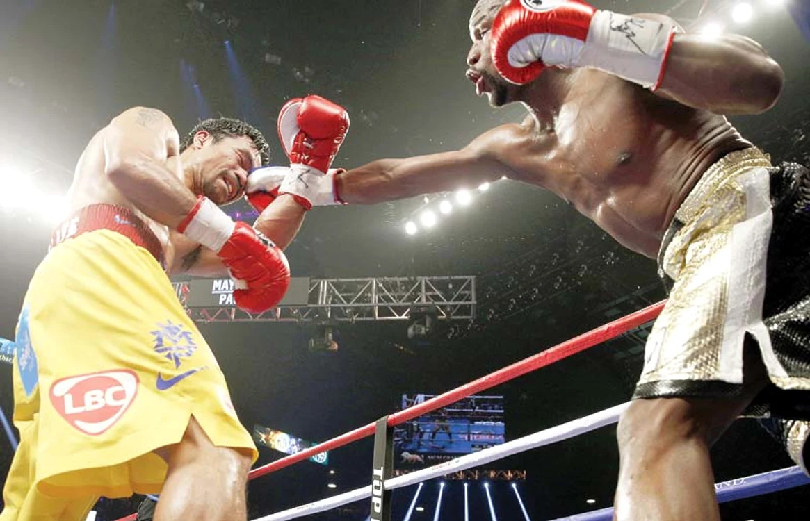 Mayweather  a câştigat la puncte  meciul cu Pacquiao