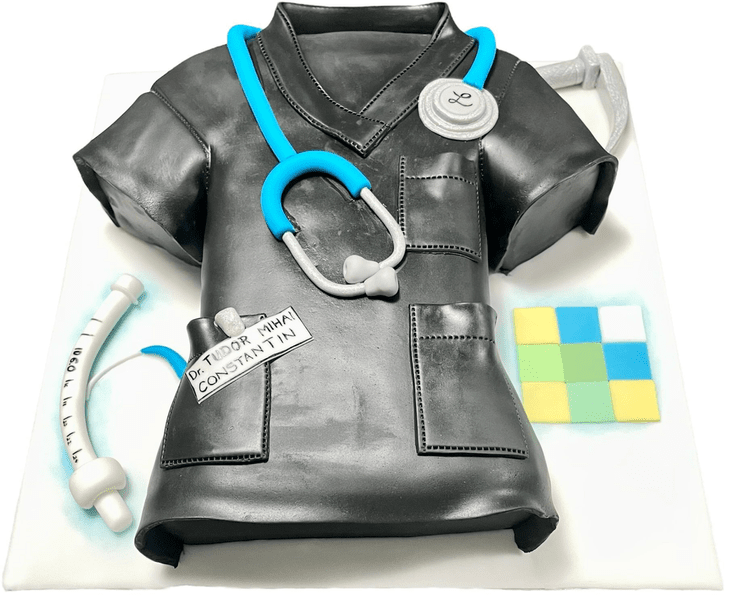 Tortul în formă de halat de medic, cu stetoscop. Desertul inedit realizat de o tânără pentru care cofetăria e o artă