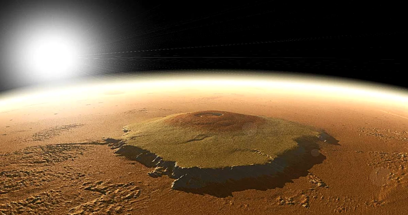 Olympus Mon, cel mai mare vulcan din sistemul solar, care a înclinat planeta Marte. 