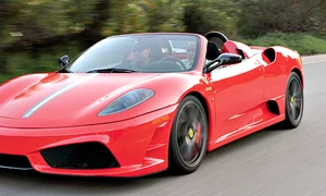 S a plimbat  o săptămână  cu un Ferrari jpeg