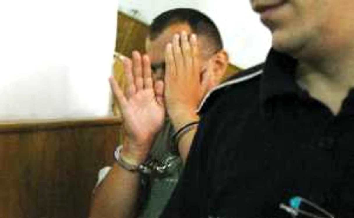Poliţistul Virgil Crişan a fost arestat