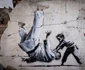 banksy ucraina putin invins la judo de un copil GettyImages 1244689520 jpg