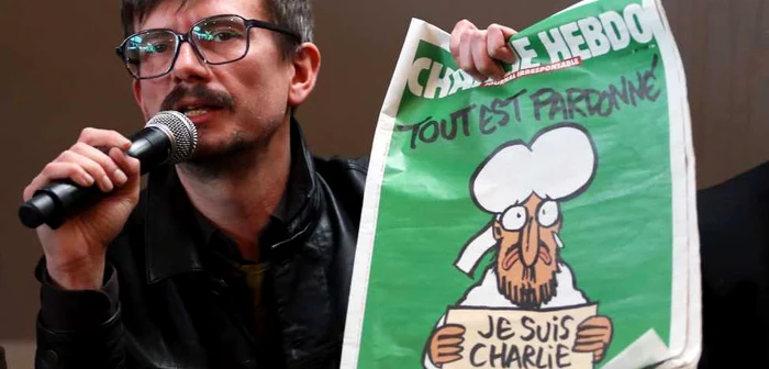 Renald Luzier arată cea mai recentă copertă Charlie Hebdo FOTO businessinsider.com