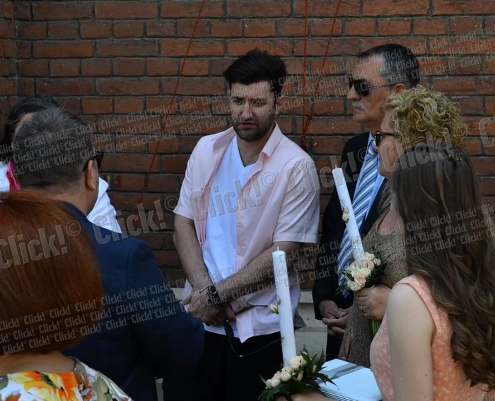 Smiley, încadrat de părinţi, la botezul celei de-a treia fetiţe a lui Pavel Bartoş