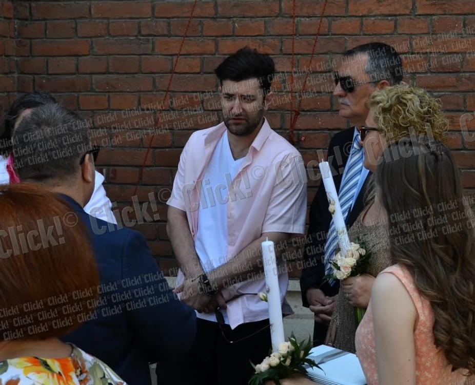 Smiley, încadrat de părinţi, la botezul celei de-a treia fetiţe a lui Pavel Bartoş
