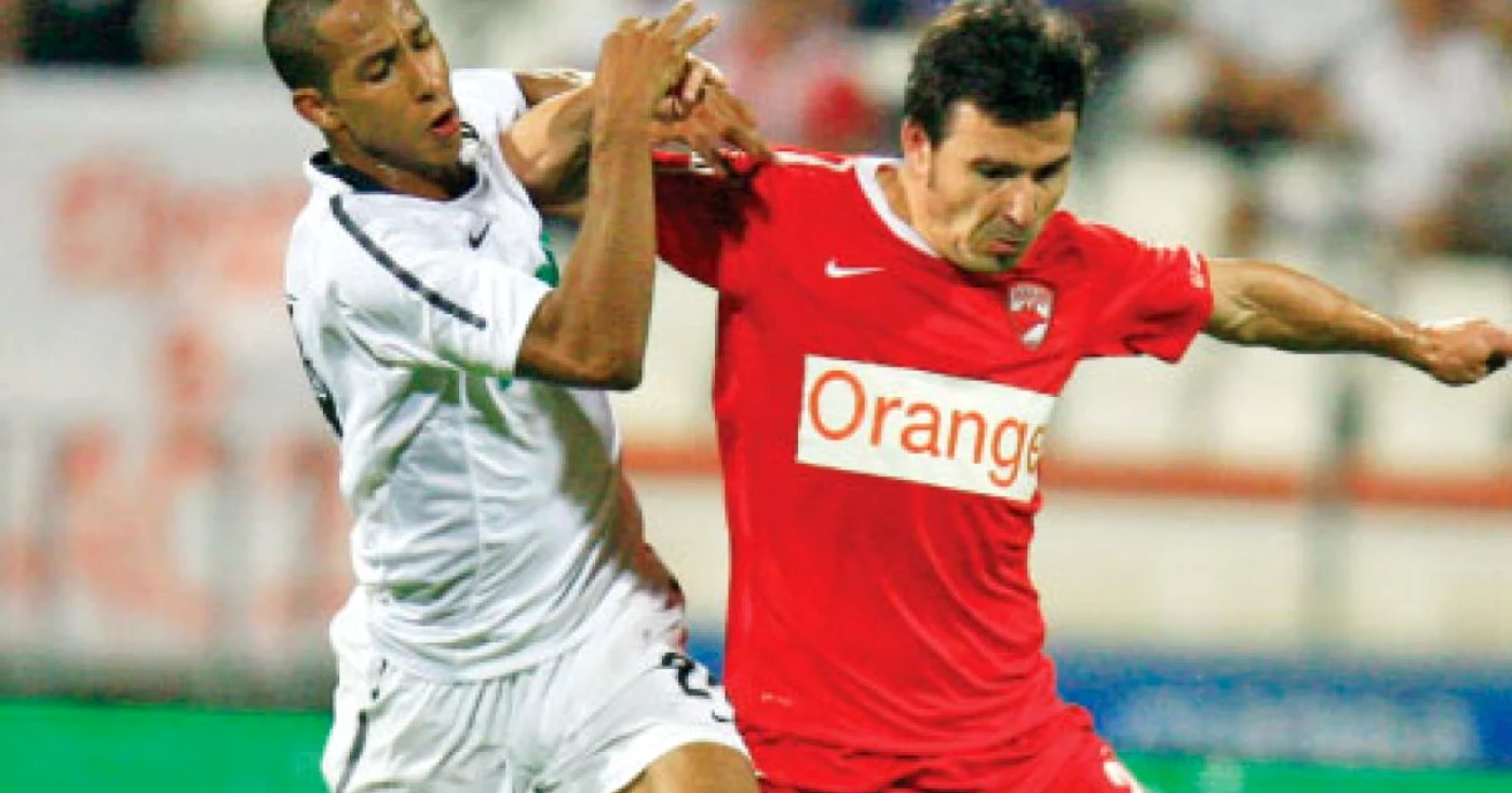 După şase ani, Cristea (dreapta) a plecat de la Dinamo  