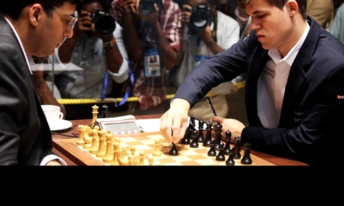 Anand și Carlsen, yoghinul și copilul jpeg
