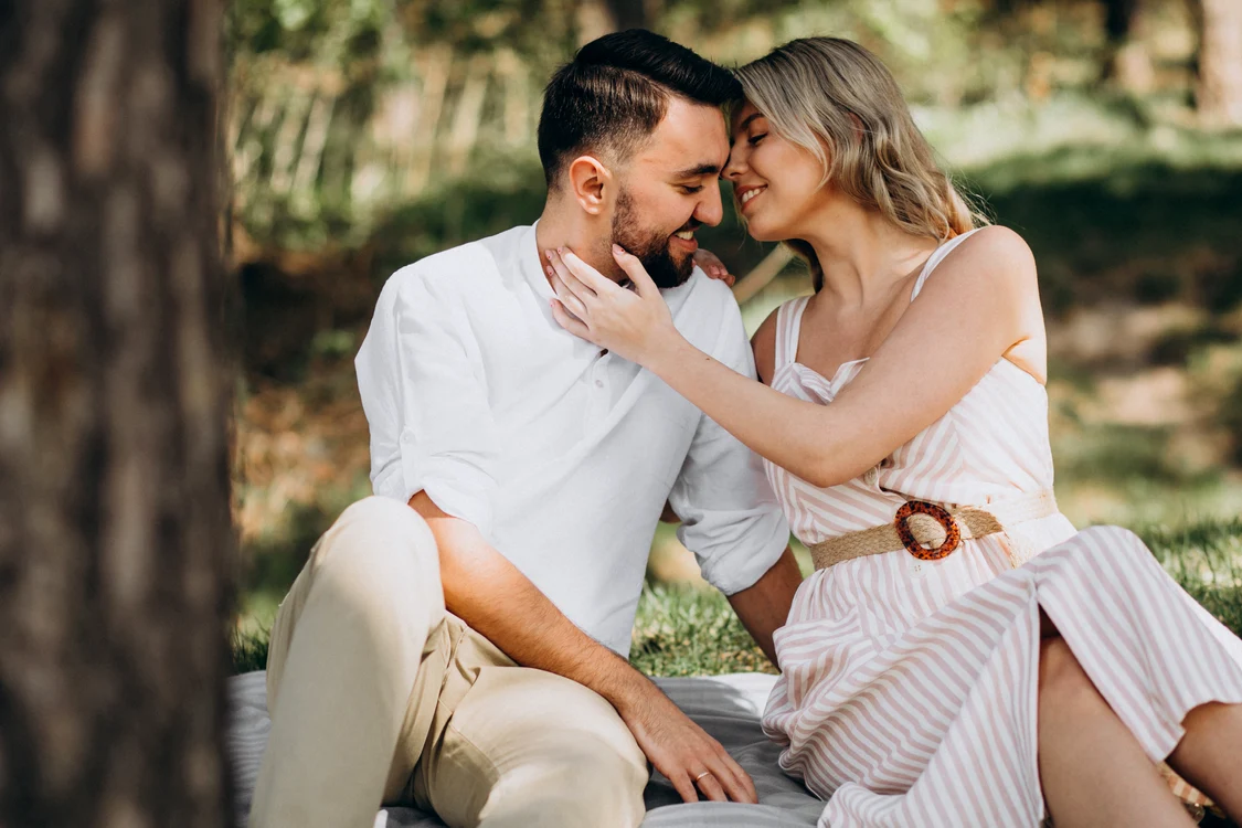 young couple having picnic forest jpg