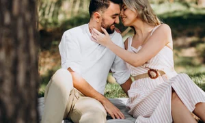 young couple having picnic forest jpg
