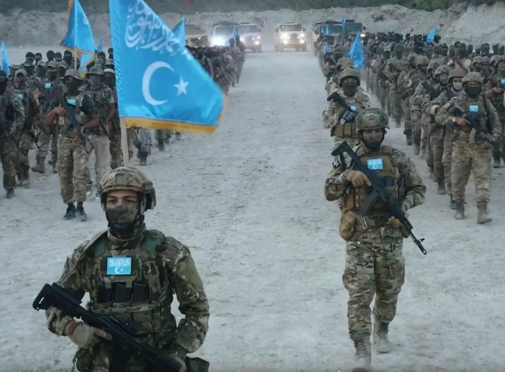 Luptători uiguri în Siria FOTO captură via The Telegraph