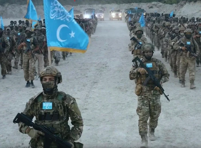 Luptători uiguri în Siria FOTO captură via The Telegraph