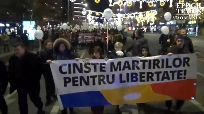 
    Marș de comemorare în București, în memoria victimelor Revoluției din 1989Foto: Captură Video  