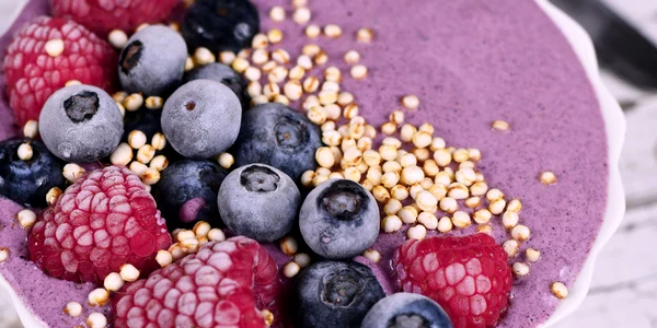 yogurt bowl with berries and puffed quinoa jpg