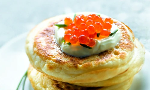 Blinis with cream and salmon roe jpeg