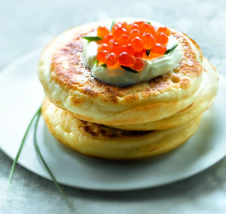 Blinis with cream and salmon roe jpeg
