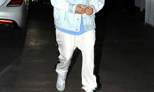 Justin Bieber seen arriving to night club with friends and he looks very happy jpeg