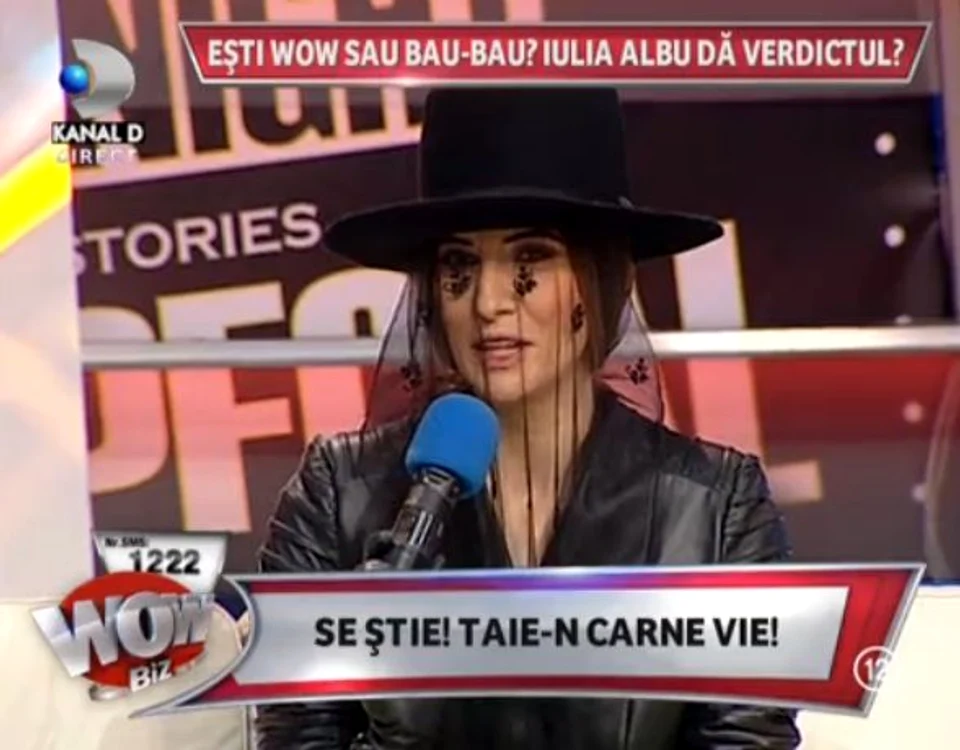 Iulia Albu a purtat o pălărie neagră şi un voal în aceeaşi nuanţă (captură: Kanal D)