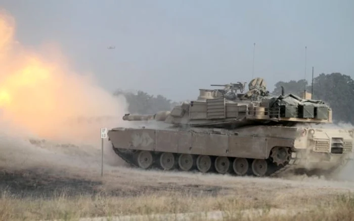 Tragere a unui tanc M1A2 FOTO Staff Sgt. Keith Anderson/1st Armored Brigade Combat Team, 1st Cavalry Division