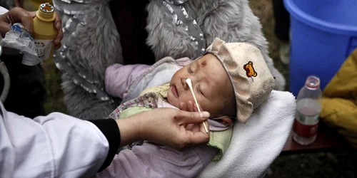 copil cutremur china reuters