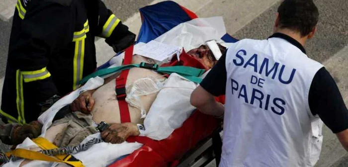 Şase persoane au murit, iar alte 200 au fost rănite, dintre care opt se află îân stare gravă după ce un tren a deraiar lângă Paris. FOTO: Reuters