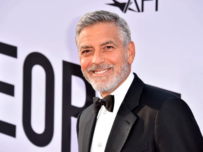 
    Amal şi George Clooney au participat la nunta ducilor de Sussex, anul trecut, pe 19 mai Foto:GettyImages   