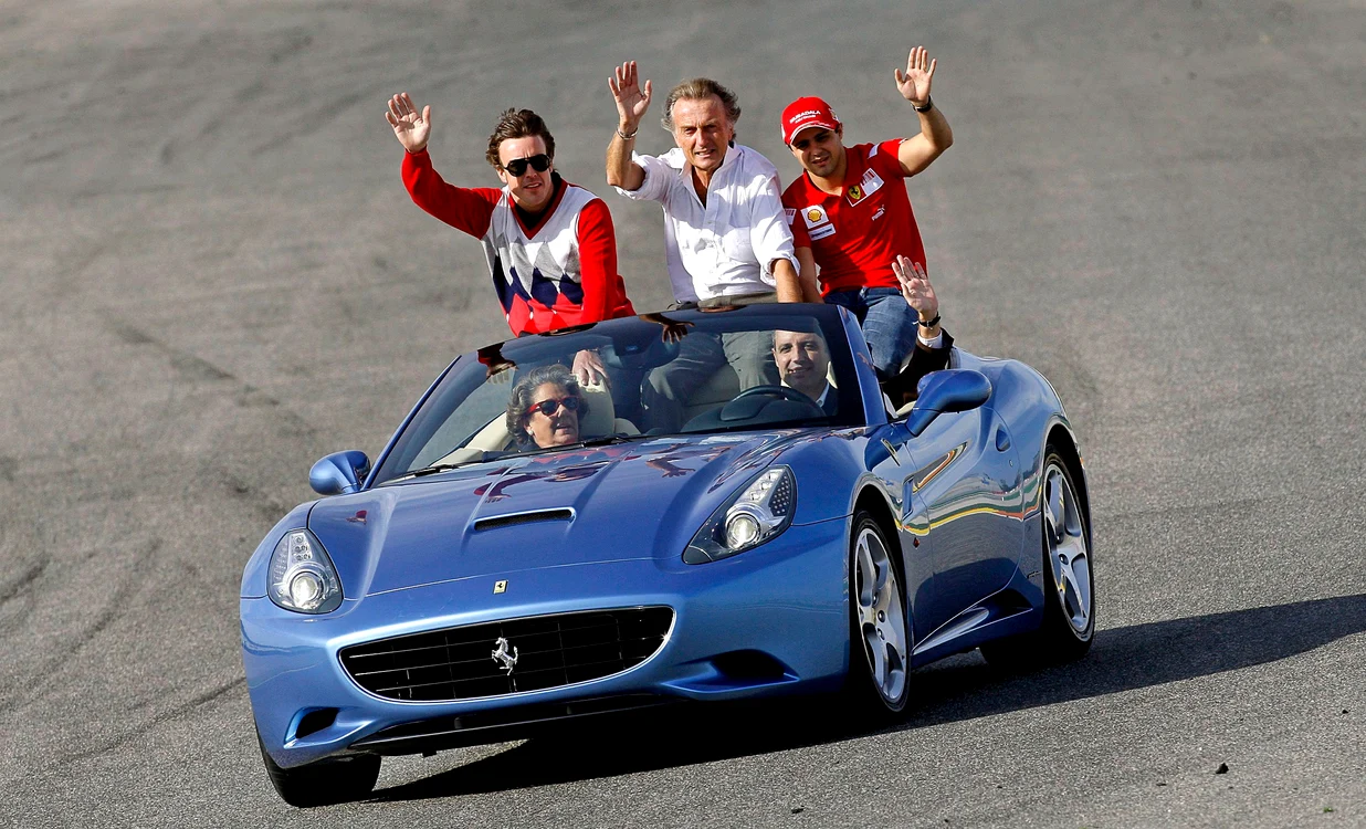 Massa (dreapta) a mers într-o maşină Ferrari alături de Alonso şi Luca di Montezemolo