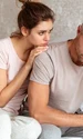 lovely couple sitting bed while woman calm down her boyfriend which upset jpg