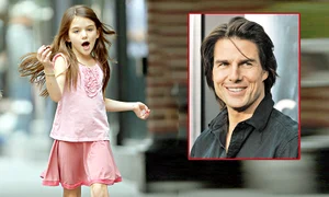 Până la 18 ani, Tom  Cruise îi plăteşte  studiile lui Suri jpeg