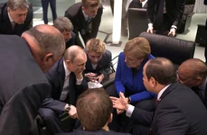 Vladimir Putin discută cu Angela Merkel, în ianuarie 2020 (foto: kremlin.ru)