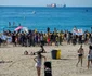 Manifestanti anti-turism protesteaza pe o plaja din Barcelona FOTO AFP