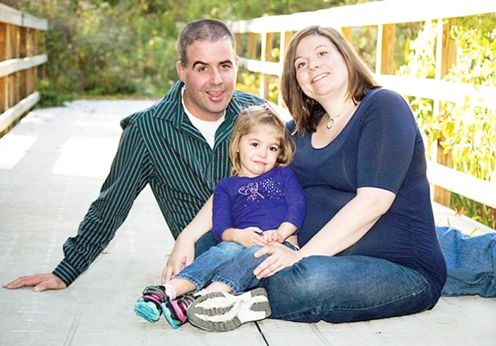 
    Mick şi Aimee Rackham, împreună cu fiica lor, Lilah   