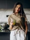 young woman drinking juice home jpg